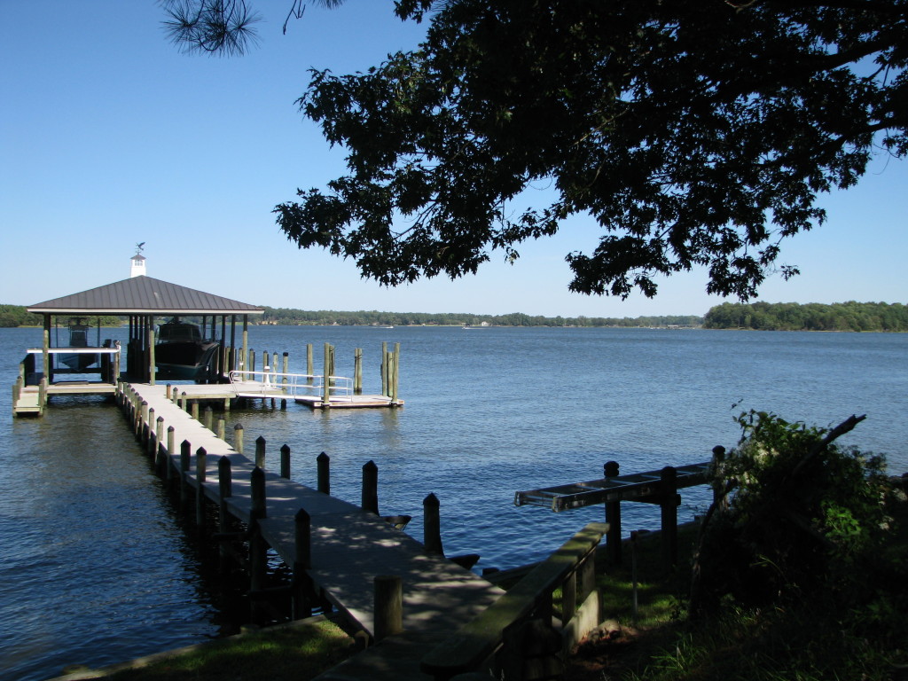 Low maintenance Pier with covered boat and yacht slips, floating dock and open very large yacht slip.